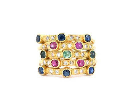 An 18 ct gold, diamond, ruby, emerald and sapphire set harem ring, in a five row design mounted with circular cut coloured ge