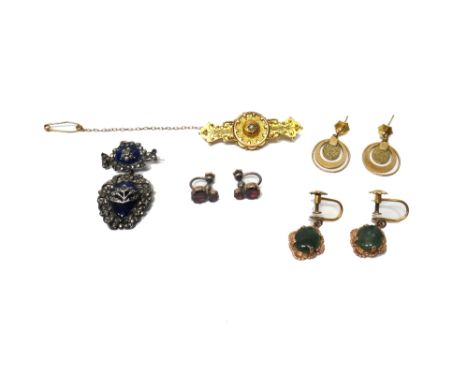 A pair of garnet set two stone earrings, the backs with screw fittings, a pair of 9ct gold oval pendant earrings, a pair of g