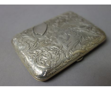 A French rectangular cigarette case, the exterior decorated with scrolls and mythological animals.  Illustrated