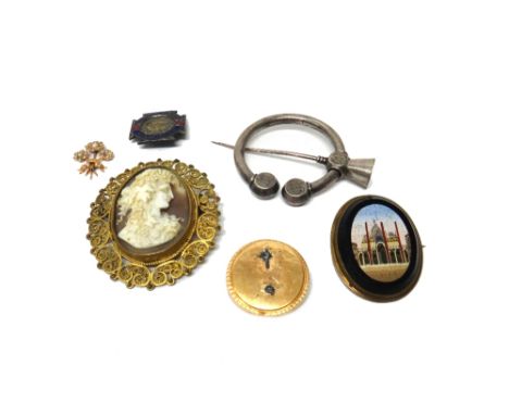 An oval mosaic brooch, designed as a classical building, a gold circular brooch, the front with a seed pearl set flower spray