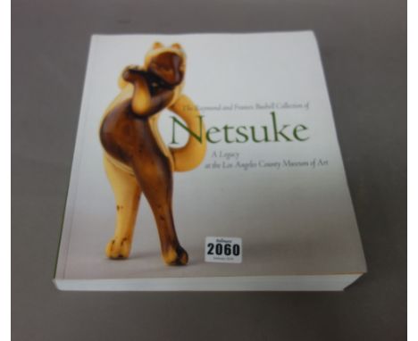 Four reference books on Japanese netsuke and works of art comprising: The Raymond and Frances Bushell Collection of Netsuke, 