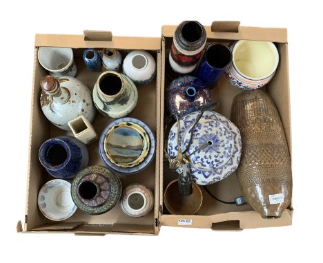 Studio pottery mallet shaped decanter, blue and white lamp, West German pottery etc in two boxes