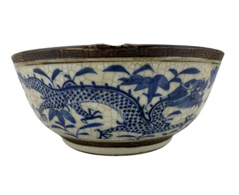 Chinese blue and white crackle glazed bowl with bronze glazed borders, D23.5cm 