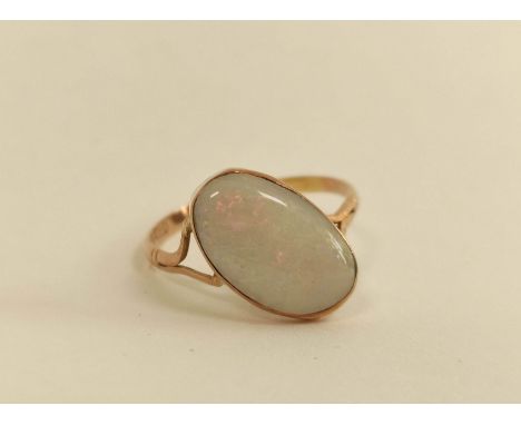 Opal ring with split shank mount, set at an angle. 