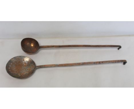 19th century beaten copper ladle, 56cm long and a similar skimmer, 60cm long.&nbsp; (2). 