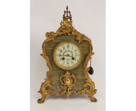 Mantel clock by Marti, Paris, with florally decorated dial in ormolu mounted queen onyx marble case of waisted shape, c1900. 