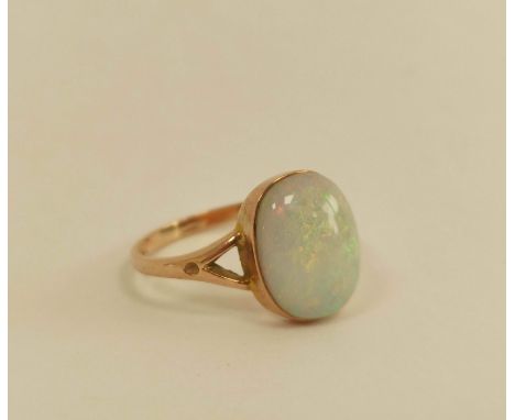 Opal ring with gold split shank mount, 9ct gold. 2.3g Size O1/2&nbsp; Appears in reasonable condition Opal almost unscratched