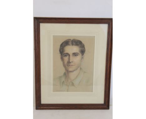 GERALD LESLIE BROCKHURST (ENGLISH 1890-1978). Portrait of a man. Pastel. 54.5cm x 24cm. Signed in pencil with Boydell Galleri