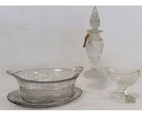 Antique cut glass twin handled oval dish, probably Irish, 22cm long on matching stand; a cut glass salt of elliptical form on