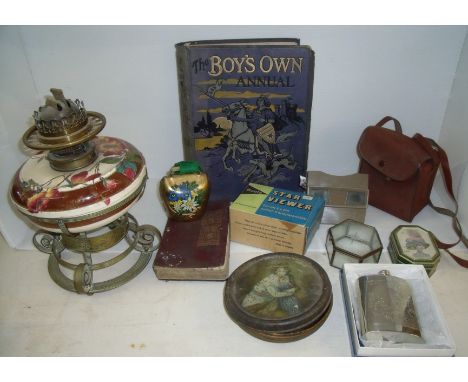 The Boys Own Annual, parafin lamp with ceramic body on brass embossed stand, circular Rowntrees Toffee tin, pewter spirit fla