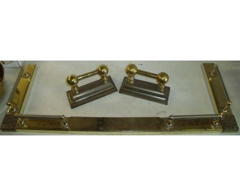 Brass extending fire fender and pair of fire dogs