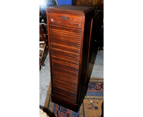 Edwardian oak office cabinet with roller shutter door revealing shelf interior 