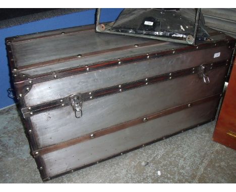 Large leather bound and silver metal finished rectangular trunk 