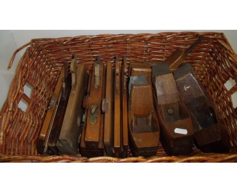Wicker basket containing selection of woodworking planes including R Spenceley, D Malloch Perth etc.