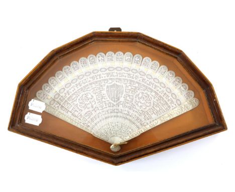 A Chinese Carved Ivory Brisé Fan, circa 1840's, Qing Dynasty, contained in a shaped and glazed wooden fan case. The 20 inner 