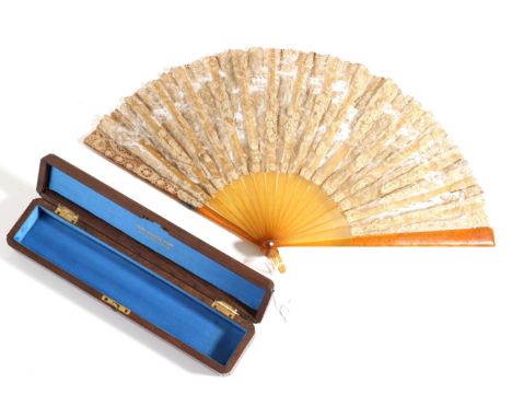 An 1870's Brussels Lace Fan, Point d'Angleterre, mounted on'' blonde tortoiseshell'' or resin sticks. The lace leaf, unbacked