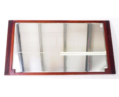 A vintage Edwardian / early 20th century large mahogany overmantel mirror. Featuring reeded edges, bevel edged mirror and two