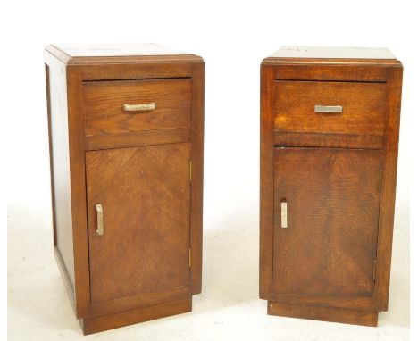 A vintage pair of art deco style bedside tables / cabinets. Each with single drawer and cupboard. Constructed of mahogany ven