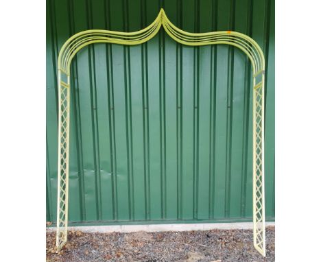 Architectural Salvage - A large vintage cream painted metal garden outdoor archway arbour. The arch way having a scrolled poi