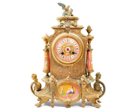 A 19th century 8-day brass, enamel and gilt metal French art nouveau style mantel clock. Featuring pink enamel Sevres manner 