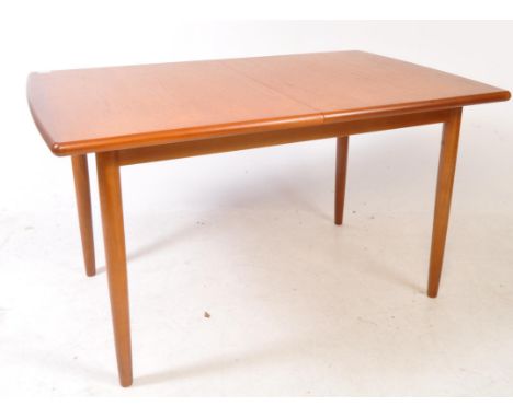 Meredew / Avalon - A vintage mid 20th century Meredew Avalon teak wood dining table. The table having folding central extendi