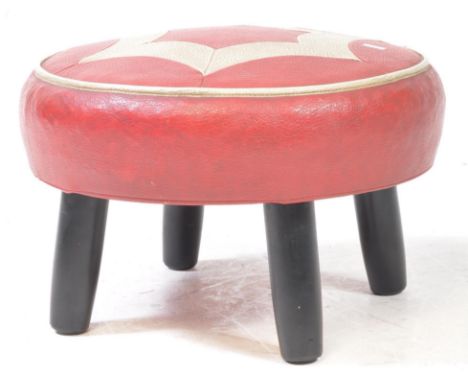 A vintage mid-century Sherborne ottoman footstool.  The stool with burundy and white hexagonal star pattern to top. All raise