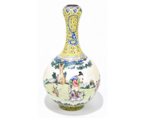 A 19th century Chinese enamel vase of bulbous form, the upper body decorated with a four claw dragon and phoenix on an imperi