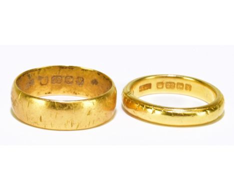 A 22ct gold wedding band (4.5g), and another 22ct gold wedding band (4.6g), size L 1/2 for the larger ring and the smaller ri