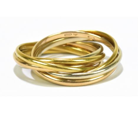 CARTIER; an 18ct yellow, white and rose gold seven band Russian wedding ring, stamped 750, size M, with authentification&nbsp