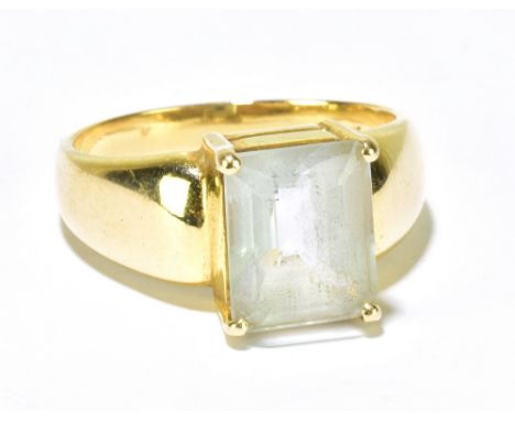 A 14ct yellow gold and pale aquamarine coloured emerald cut four claw set ring, size Q 1/2, 6.2g.