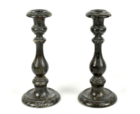 A pair of 19th century serpentine candlesticks, height 25cm (af) (2).&nbsp;Additional InformationBoth candlesticks have been 