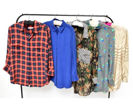 EQUIPMENT; a grey floral 100% silk lady's blouse, size large, a camouflage and orange butterfly blouse, size small, and three
