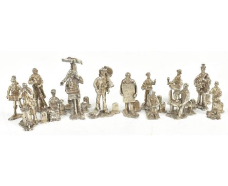 THOMAS CHARLES JARVIS; a set of fourteen Elizabeth II hallmarked silver figures including a chimney sweep, a musician, a pape