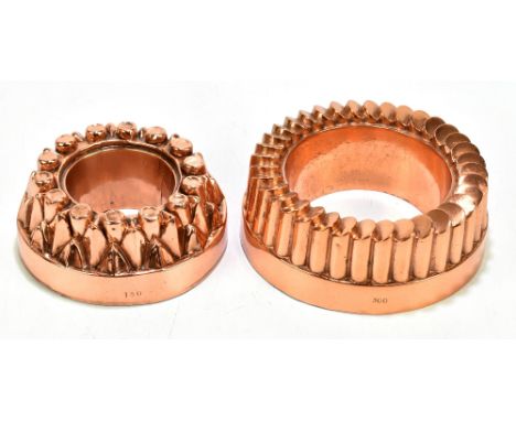 Two circular open moulds, one no.300, diameter 17.5cm, the second no.150, diameter 15cm, both with drill holes to the rims.Ad