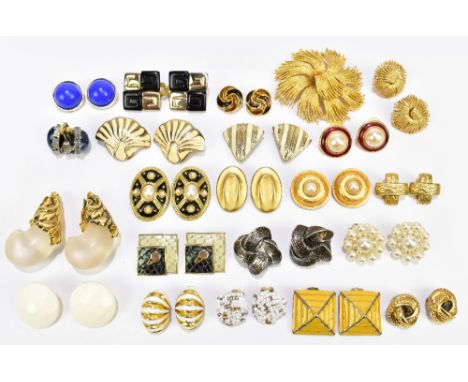 MONET; a large 1980s gold tone brooch with matching clip-on earrings and nineteen further pairs of 1980 clip-on earrings, mos