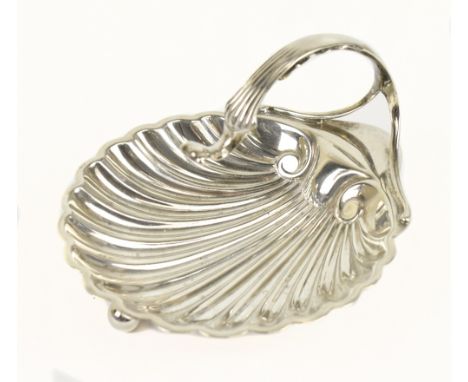 HARRISON BROS &amp; HOWSON; an Edwardian hallmarked silver shell shaped butter dish with swan neck handle, London 1911, 3.8oz