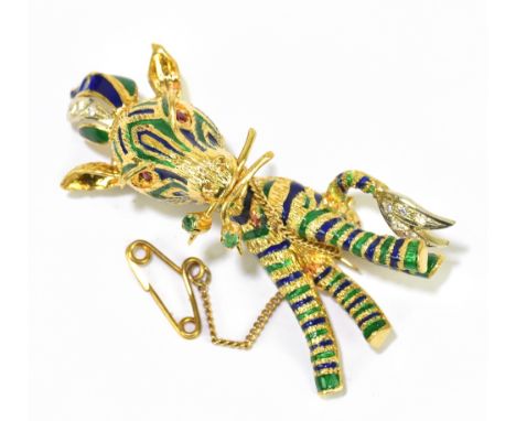 An unusual yellow metal enamel decorated and gem set brooch in the form of a zebra, the mane and tail set with eight small di