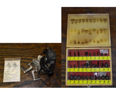 An ELU router MF96, complete with original catalogue and instructions and two small metal vices, together with a modern cased