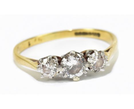 An 18ct yellow gold diamond set three stone dress ring, approx size K, approx weight 1.g.Additional InformationThe mount is b