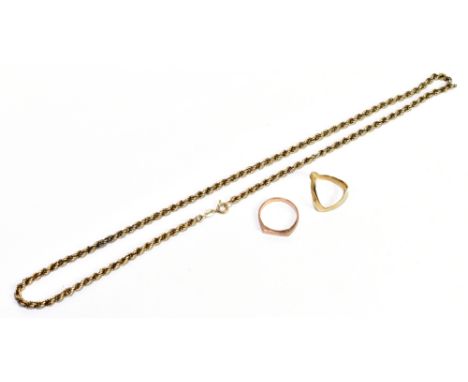 A 9ct yellow gold wishbone ring, size S, 2.25g, a yellow metal ring, 2.8g, and an unmarked yellow metal damaged rope twist ch