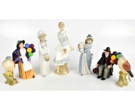 ROYAL DOULTON; two figures comprising 'The Balloon Man' HN1954, and 'Balloon Lady' HN2935, with a figure of Rose Arbour HN314