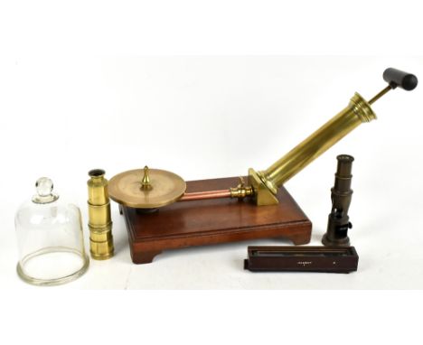 A brass six drawer telescope (af), an unusual pump on wooden plinth base, a travelling microscope, and a military compass sta