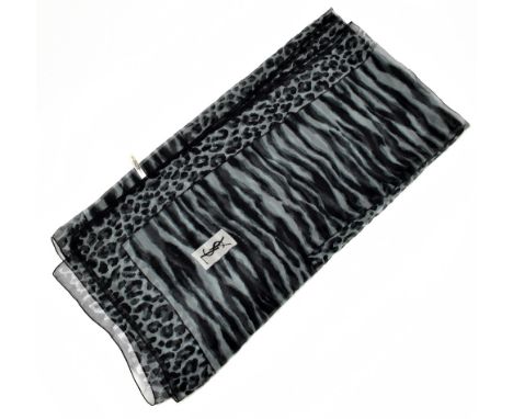 YVES SAINT LAURENT; a large 100% silk grey and black leopard print scarf with YSL logo to front, 140 x 140cm.Additional Infor