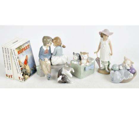 LLADRO; a model of a cat and a mouse, height 8.5cm, with two Nao models of cats, and two Nao figures, and a Wedgwood Rupert t