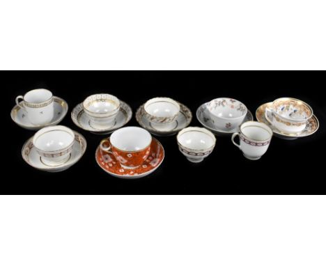 NEW HALL; a collection of teacups, tea bowls, and saucers, including a four piece set decorated with gilt and red painted det