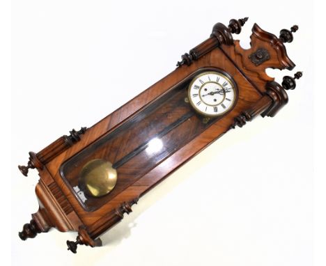 A 19th century rosewood Vienna style wall clock, the enamel dial set with Roman numerals and subsidiary dial.Additional Infor