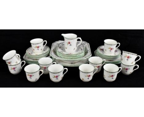 SHELLEY; a part tea service, comprising twelve cups and eleven saucers, eleven sandwich plates, six dessert bowls, two cake p
