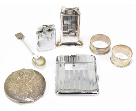 DUNHILL; a silver plated table lighter, height 10cm, together with a chrome Ronson lighter, a novelty cigarette case/lighter,