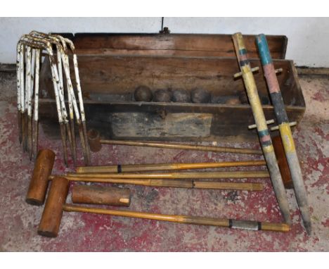 JAQUES & SONS, LONDON; a vintage pine cased croquet set including five mallets of varied sizes and eight balls, also various 