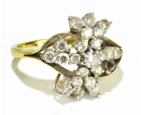 A yellow metal and diamond set dress cluster ring, size M, approx 5.5g.Additional InformationOne of the diamonds is missing, 